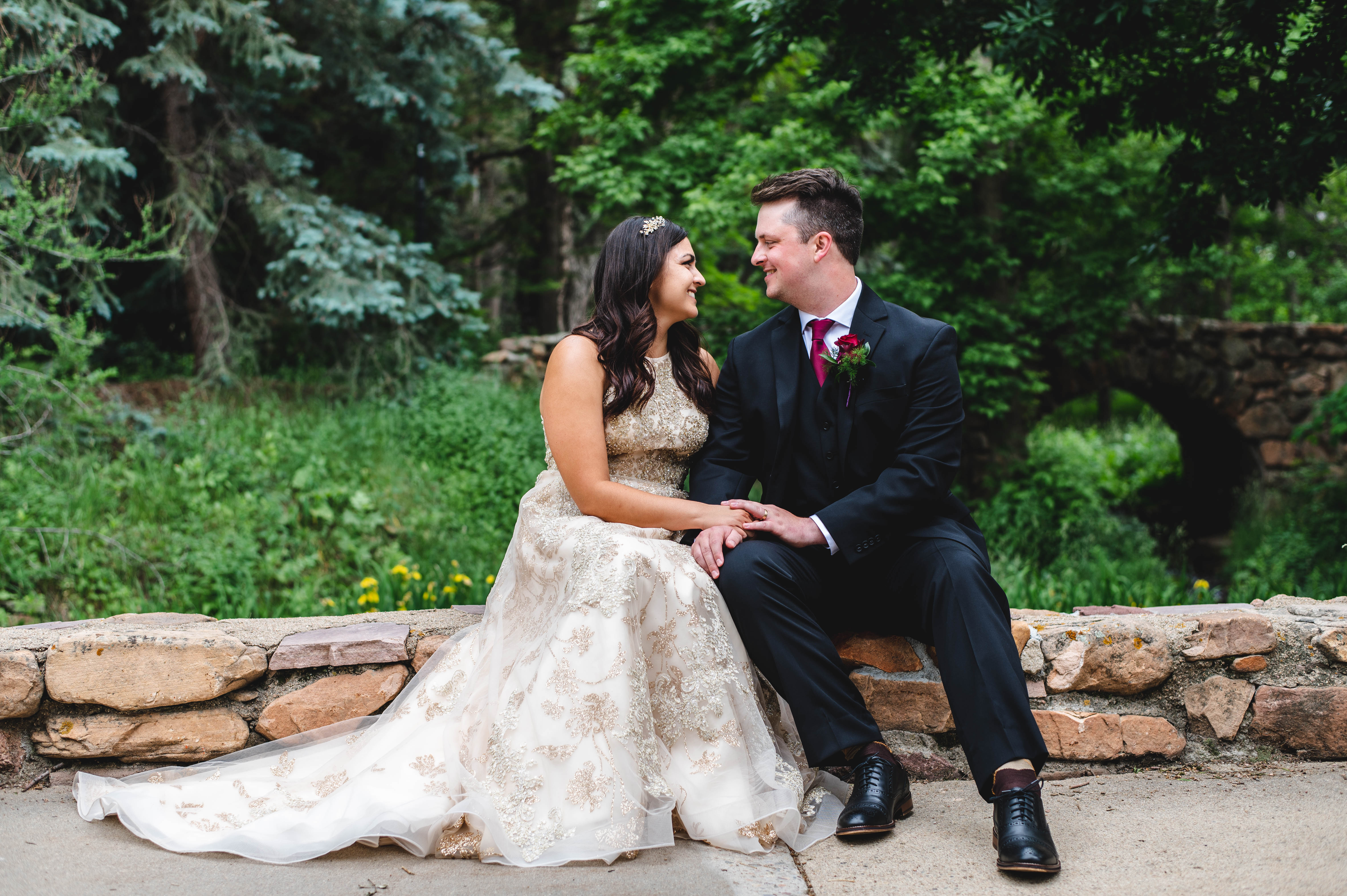 Anika & Jeff sitting together on their wedding day